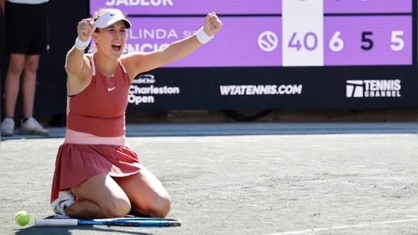 Belinda Bencic downs Ons Jabeur to win first clay title in Charleston