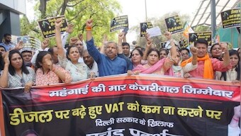 Delhi: BJP holds protest against AAP government for not reducing VAT on petrol, diesel
