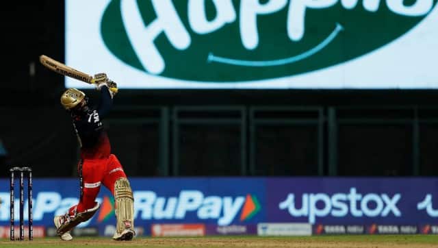 Dinesh Karthik of Royal Challengers Bangalore hitting a over boundary during match 13 of the TATA Indian Premier League 2022 (IPL season 15) between the Rajasthan Royals and the Royal Challengers Bangalore held at the Wankhede Stadium in Mumbai on the 5th April 2022 Photo by Saikat Das / Sportzpics for IPL