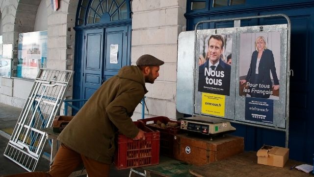 Emmanuel Macron vs Marine Le Pen: France votes in tense presidential runoff Emmanuel Macron vs Marine Le Pen: France votes in tense presidential runoff
