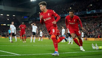 Champions League: Liverpool survive late collapse against Benfica at Anfield to keep quadruple hopes alive