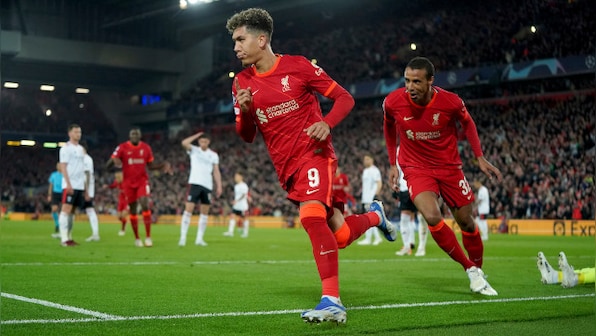 Champions League: Liverpool survive late collapse against Benfica at Anfield to keep quadruple hopes alive