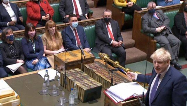 A video grab from footage broadcast by the UK Parliament's Parliamentary Recording Unit (PRU) shows Britain's main opposition Labour Party deputy leader Angela Rayner listen as British Prime Minister Boris Johnson speaks during Prime Minister's Questions (PMQs), in the House of Commons in London in January 2022. AFP