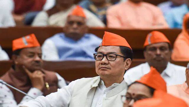 Union Law Minister Kiren Rijiju with BJP MPs listen to PM Narendra Modi's virtual address on the party's Foundation Day, in New Delhi, on Wednesday. PTI