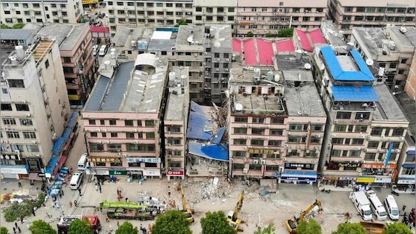 Two more survivors pulled from collapsed building in China, dozens feared missing