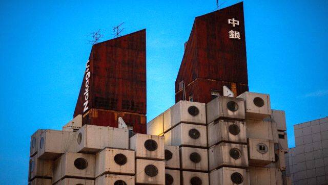 The landmark Nakagin Capsule Tower is an example of Japan's postwar architectural design movement known as Metabolism. AFP