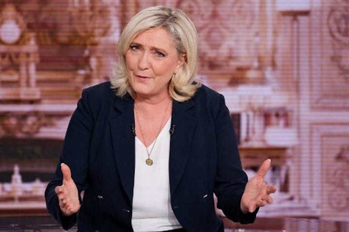 French presidential candidate Marine Le Pen vows to impose fines on Muslims who wear headscarves in public