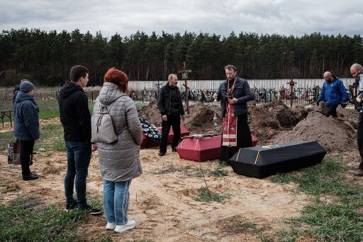 Three bodies with hands tied found near Ukraine's Bucha, say local police Three bodies with hands tied found near Ukraine's Bucha, say local police