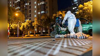 China's Shanghai eases 2-week COVID lockdown, letting some residents out