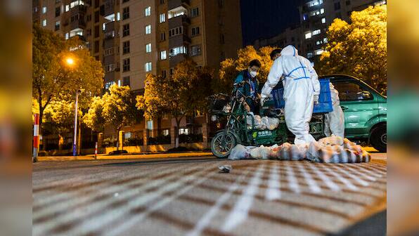 China's Shanghai eases 2-week COVID lockdown, letting some residents out