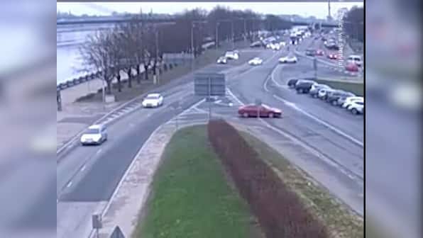 Watch: Parked car slides down busy road, plunges into river in Europe; video goes viral