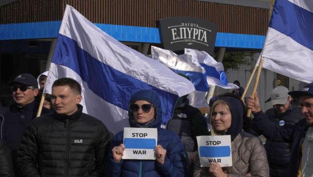 Explained: Why Russia's anti-war protesters have adopted a new national flag Explained: Why Russia's anti-war protesters have adopted a new national flag