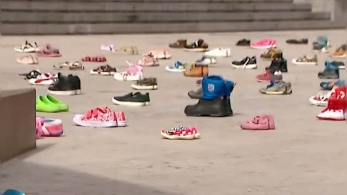 Watch: Georgia activists place 145 pairs of shoes outside parliament to honour kids who died in Ukraine war