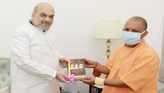 Yogi Adityanath meets Amit Shah in Delhi, gifts him book by Suryakant Bali Yogi Adityanath meets Amit Shah in Delhi, gifts him book by Suryakant Bali