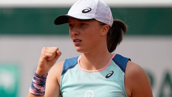 French Open: Iga Swiatek clinches 30th successive win as Tsitsipas survives another Roland Garros rollercoaster