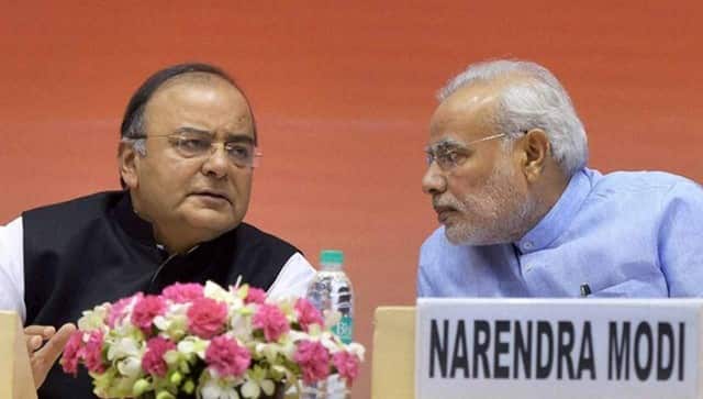 Arun Jaitley and Narendra Modi. PTI