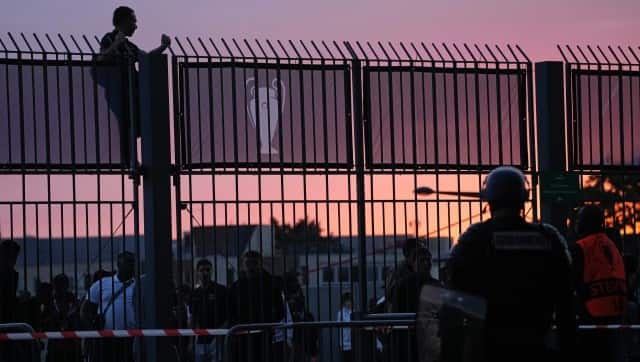 File photo of French Police deploying tear gas on supporters waiting in long lines to get into the Stade de France for the Champions League final. AP