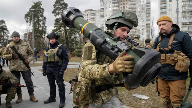 A Ukrainian Territorial Defence Forces member holds an NLAW anti-tank weapon, in the outskirts of Kyiv, Ukraine, 9 March, 2022. AP