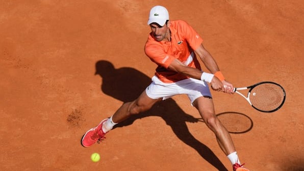 Italian Open: Novak Djokovic, Ons Jabeur progress in Rome but back injury stops Emma Raducanu