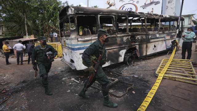 Sri Lankan ex-PM Mahinda Rajapaksa, family members flee to Trincomalee Naval Base, holed up by protesters Sri Lankan ex-PM Mahinda Rajapaksa, family members flee to Trincomalee Naval Base, holed up by protesters