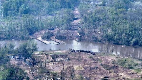 Russian forces suffer heavy losses in failed river crossing, say Ukrainian and British officials
