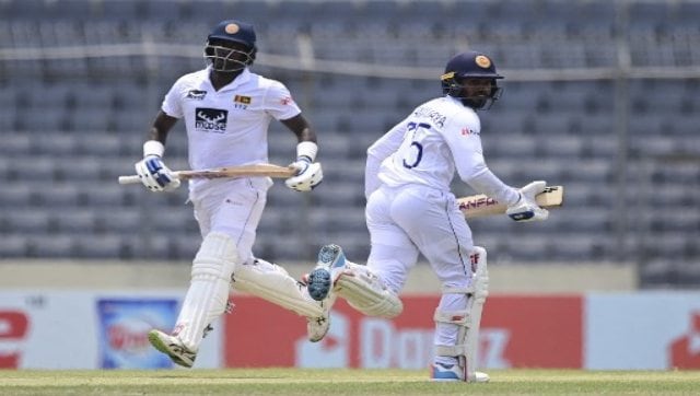 Sri Lanka's Dhananjaya de Silva (right) and Sri Lanka's Angelo Mathews (left) run between the wickets during Day 3 of the second Test between Bangladesh and Sri Lanka at the Sher-e-Bangla National Cricket Stadium in Dhaka on Wednesday. AFP