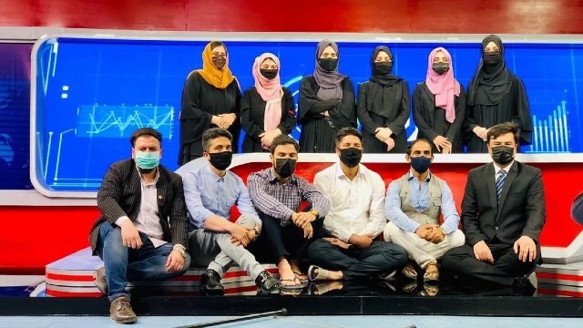 Why are male Afghan TV presenters masking up?