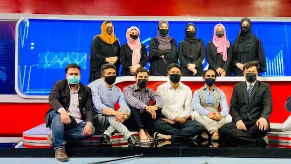 Explained: Why are male Afghan TV presenters masking up?