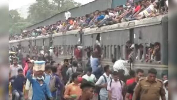 WATCH: Thousands rush to train stations, ferry terminals to return home and celebrate Eid-al-Fitr in Bangladesh