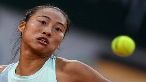 'I wish I was a man,' says China's Zheng as stomach cramps end French Open bid