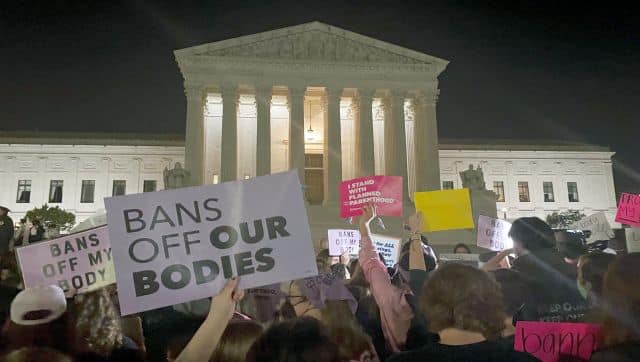 A crowd of people gather outside the Supreme Court to protest the overturning of the Roe v Wade ruling of 1973. AP