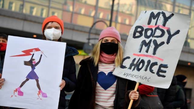 File image of demonstrators protesting with placards against Poland's near-total ban on abortion during a demonstration in Berlin in 2020. AFP