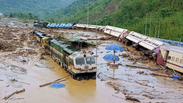 Train coaches are seen toppled over following mudslides triggered by heavy rains at New Haflong railway station on the Lumding-Silchar route at Dima Hasao district, in Assam.AP