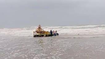 Watch | Mysterious gold coloured chariot washes ashore in Andhra Pradesh