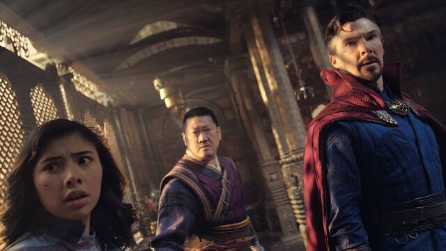 (L-R): Xochitl Gomez as America Chavez, Benedict Wong as Wong, and Benedict Cumberbatch as Dr. Stephen Strange in Marvel Studios’ DOCTOR STRANGE IN THE MULTIVERSE OF MADNESS | Photo courtesy of Marvel Studios. ©Marvel Studios 2022. All Rights Reserved.