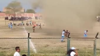 Watch: Dust devil sweeps through football match in Peru