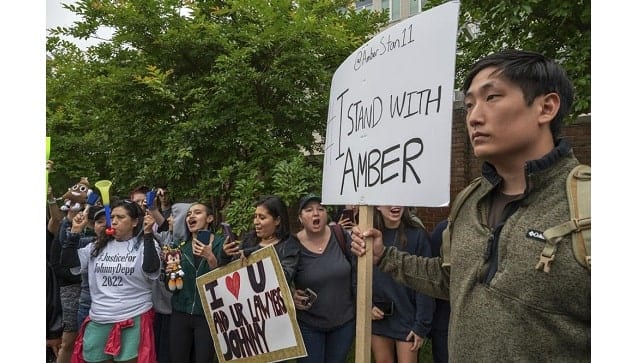 Supporters of both actors Johnny Depp and Amber Heard rally outside of the Fairfax County Courthouse Friday, May 27, 2022 in Fairfax |(AP Photo/Craig Hudson)