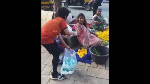 Watch: Little boy gives water bottles to roadside vendors amid scorching heat; heartwarming video goes viral