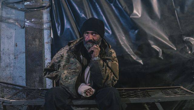 An Azov Special Forces Regiment's serviceman inside the Azovstal steel plant in Mariupol, Ukraine, on 10 May. The Ukrainian forces who made a determined last stand in a Mariupol steel mill against Russian troops were a mixture of seasoned soldiers, border guards, a controversial national guard regiment and volunteers who took up arms in the weeks before Russia's invasion. Dmytro 'Orest' Kozatskyi/Azov Special Forces Regiment of the Ukrainian National Guard Press Office via AP