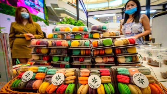 A vendor sells macarons containing cannabis at a fair in Bangkok. AFP