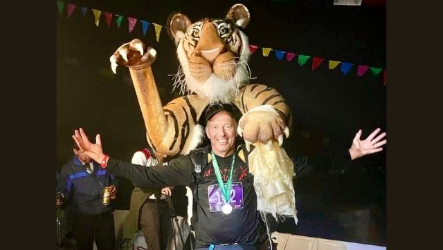 Watch: UK wildlife photographer takes part in Everest Marathon in tiger suit Watch: UK wildlife photographer takes part in Everest Marathon in tiger suit