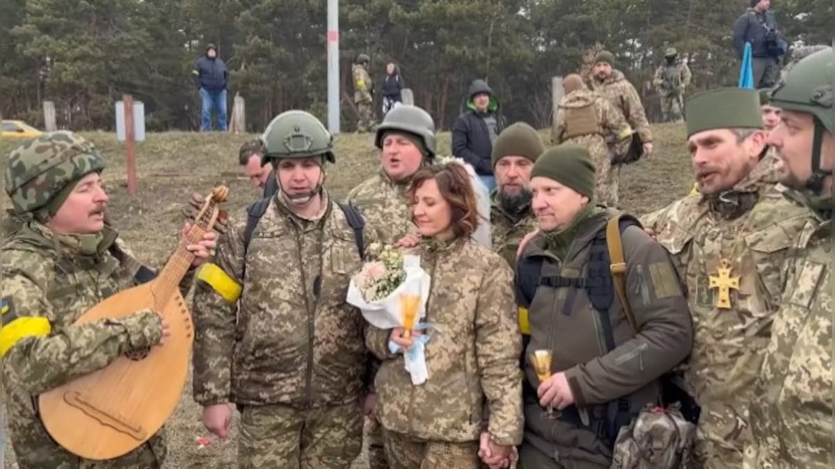 Watch|‘No white dresses and tuxedos’: Ukrainian couple ties knot in military outfit