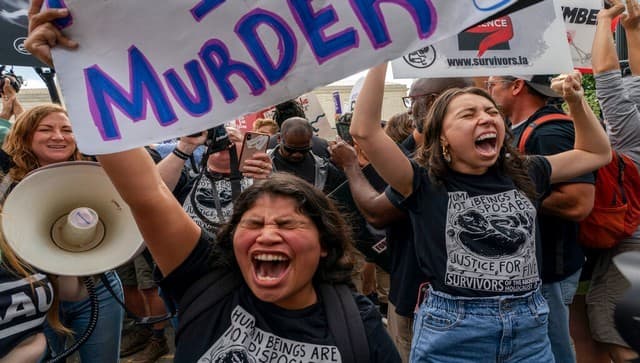 Anti-abortion protesters gather outside the Supreme Court in Washington, Friday, June 24, 2022. AP