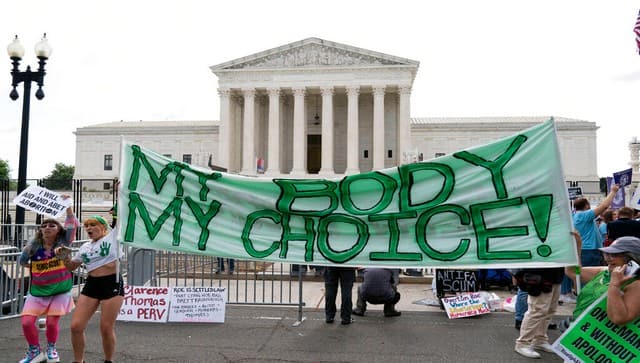 Abortion right activists gather outside the Supreme Court in Washington, Friday, June 24, 2022. AP