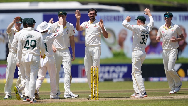 Khawaja keeps Australia poised after bowlers bundle out Sri Lanka for 212 Khawaja keeps Australia poised after bowlers bundle out Sri Lanka for 212