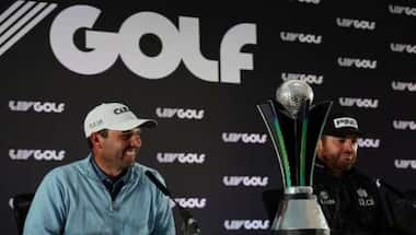 Charl Schwartzel celebrates as golf's power struggle deepens