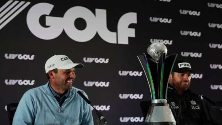 Charl Schwartzel celebrates as golf's power struggle deepens