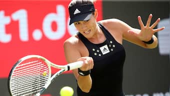 Eastbourne International: Garbine Muguruza gets much-needed win, into last-16