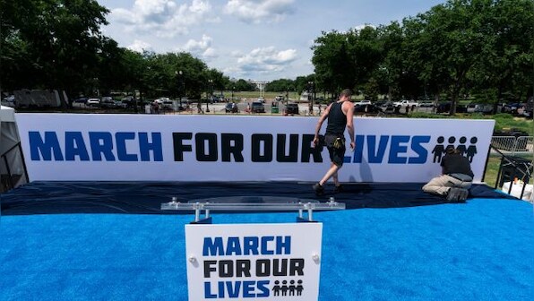 Thousands rally for gun reform in US after surge in mass shootings
