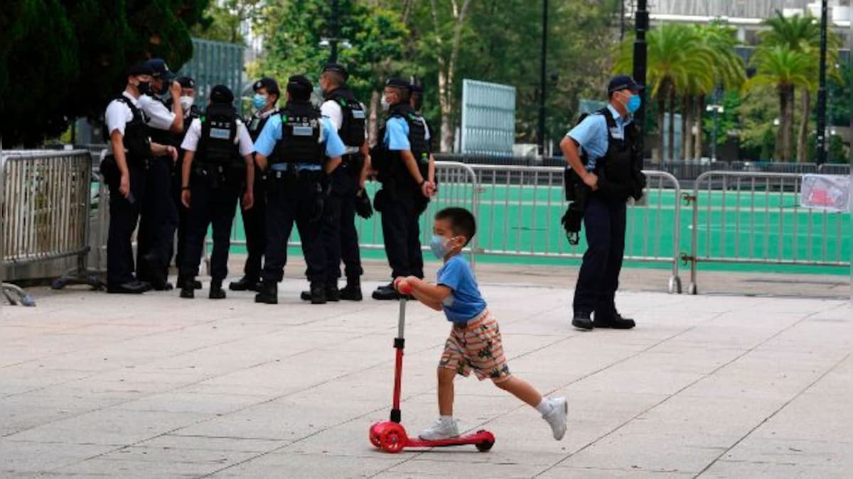 Police patrol Hong Kong’s Victoria Park to enforce the Tiananmen Square vigil ban